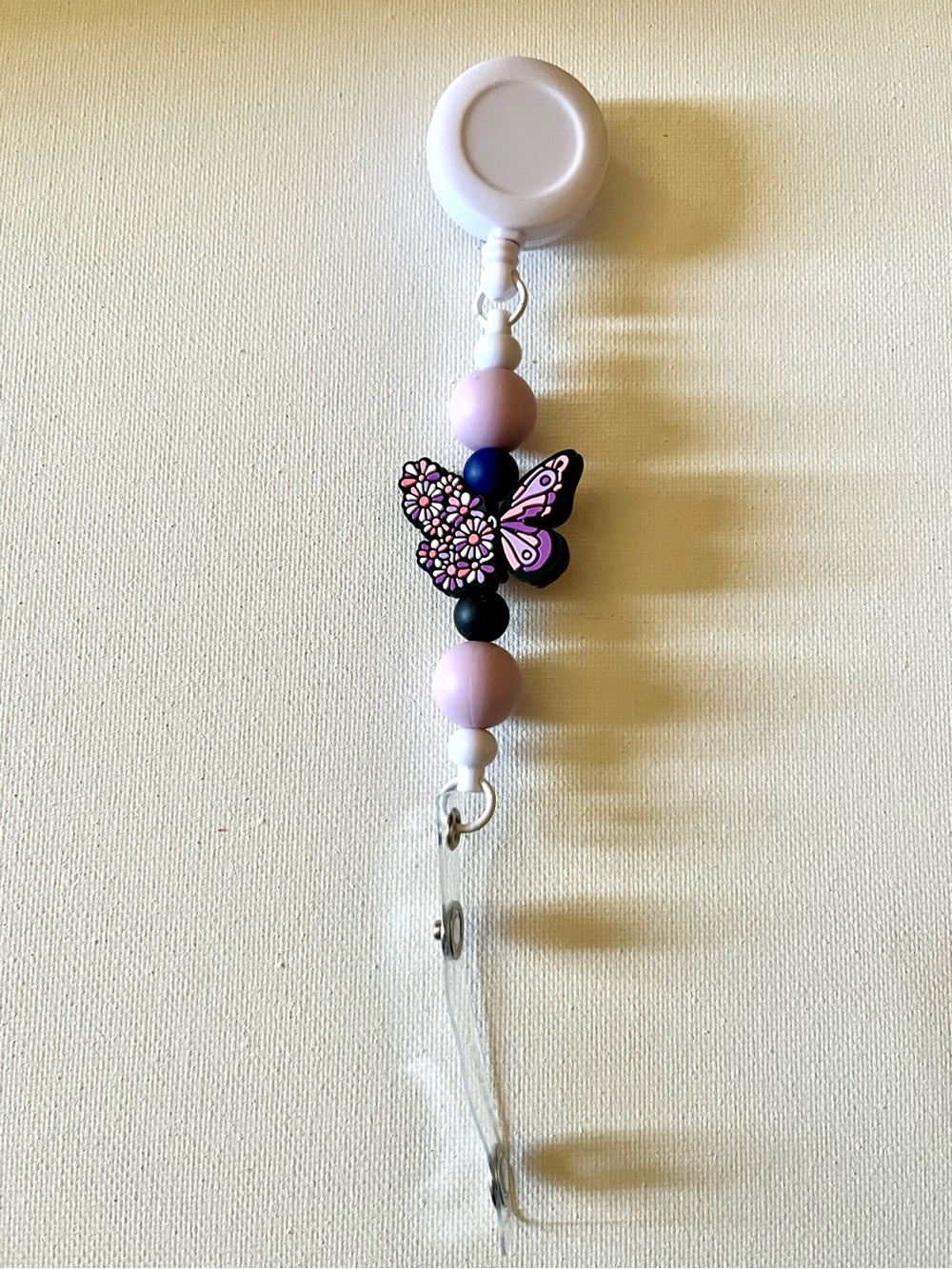 Purple, Lavender, Black and Orange Floral Butterfly Badge Reel